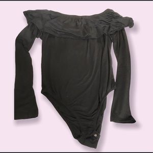 Discreet brand body suit, black with wide elastic ruffle